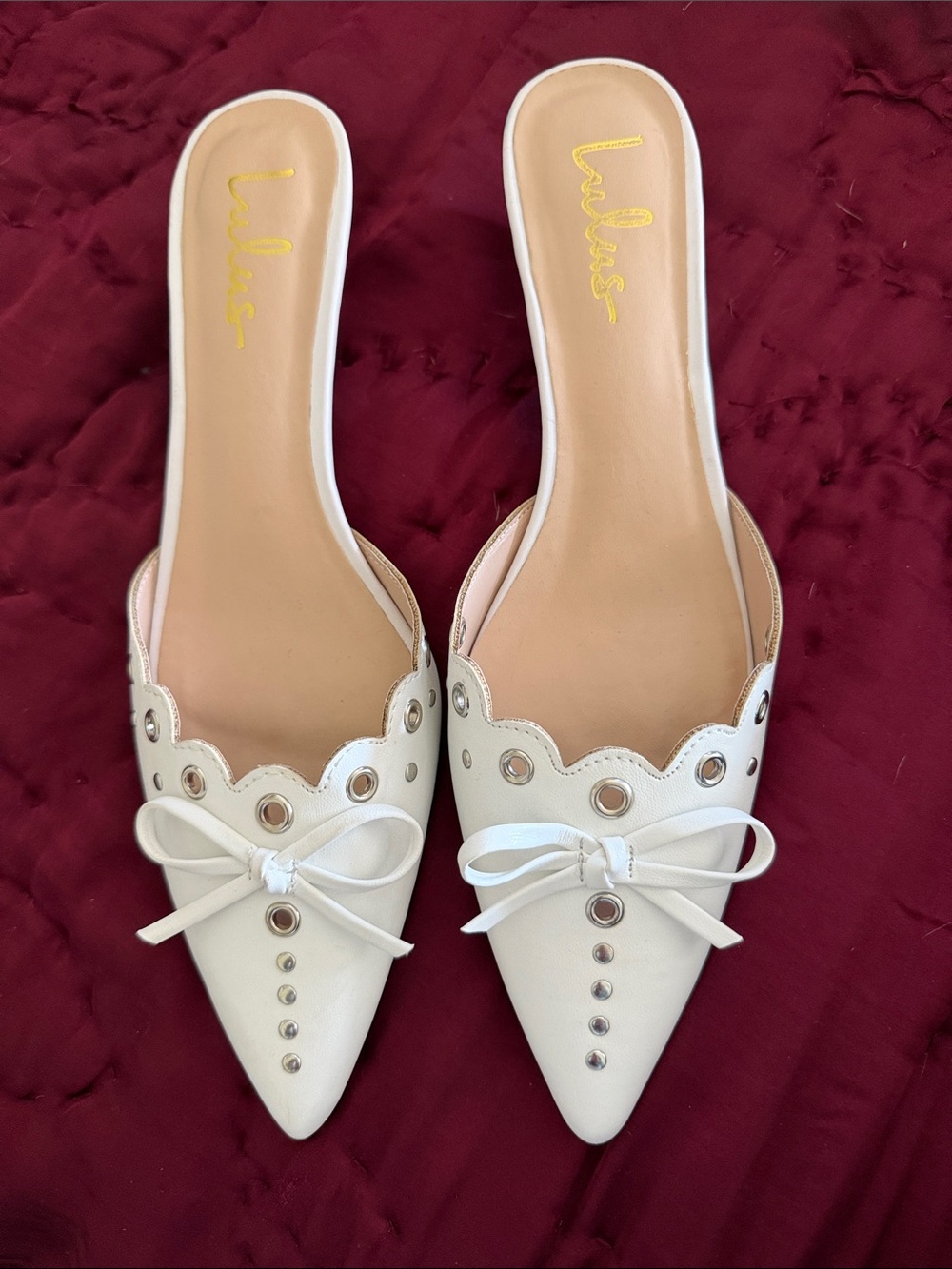 Lulu's Ivory Scalloped Pointed-Toe Slip-On Mules with Bow & Grommets